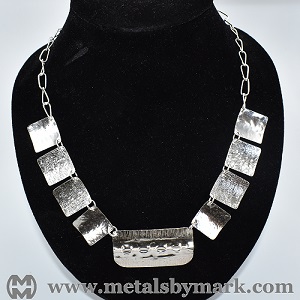 paneled hybrid disc foldformed necklace