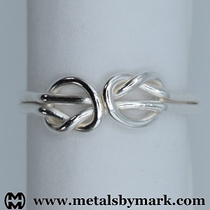 interconnected dual knot ring