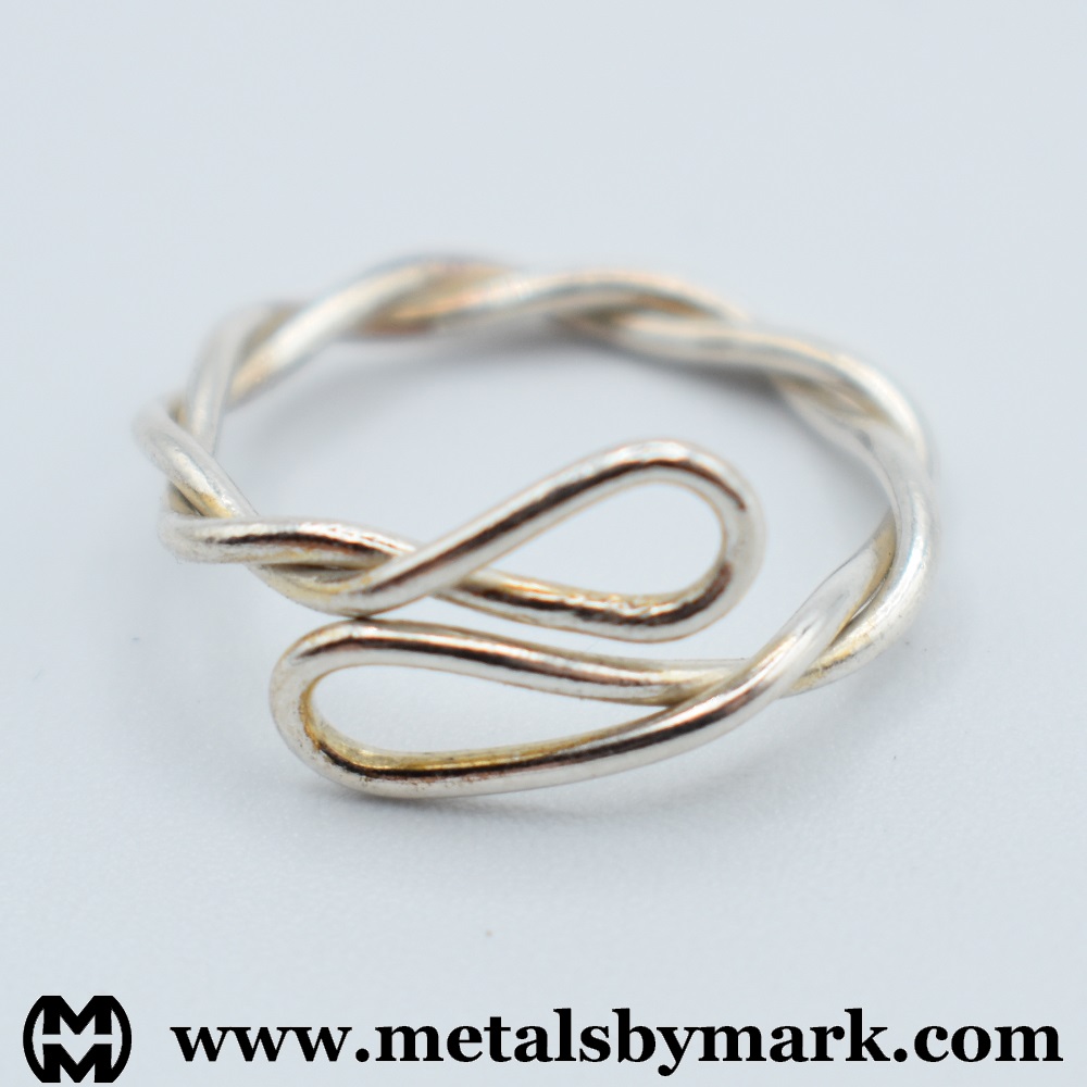 twisted dual loop bypass ring